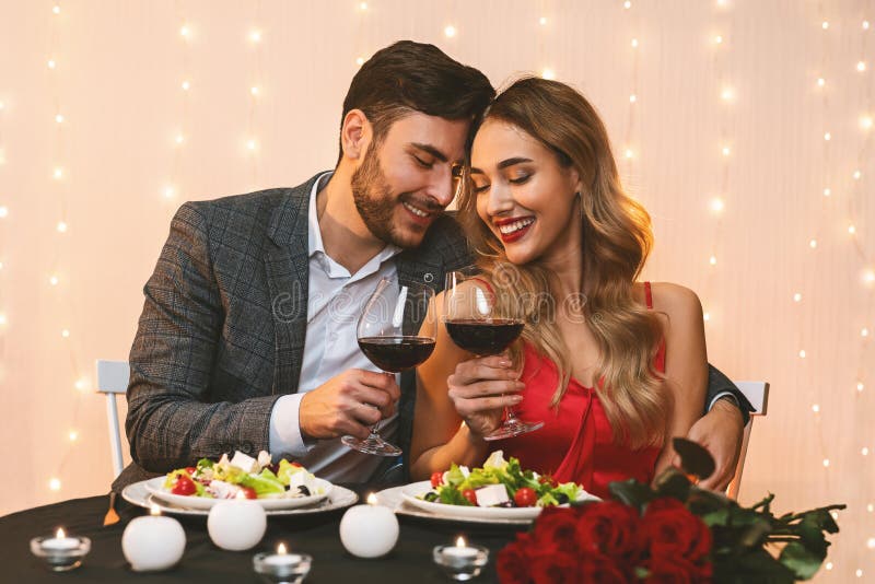 Serious dating couple at restaurant
