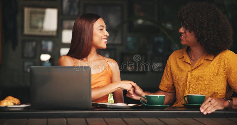 Young adults meeting at coffee shop